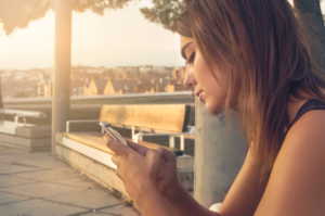 woman, smartphone, technology, communication, texting, chatting, using the phone, young woman, daylight, face, female, girl, hands, mobile phone, model, outdoors, caucasian, smartphone, smartphone, texting, texting, texting, texting, texting, chatting, mobile phone, mobile phone